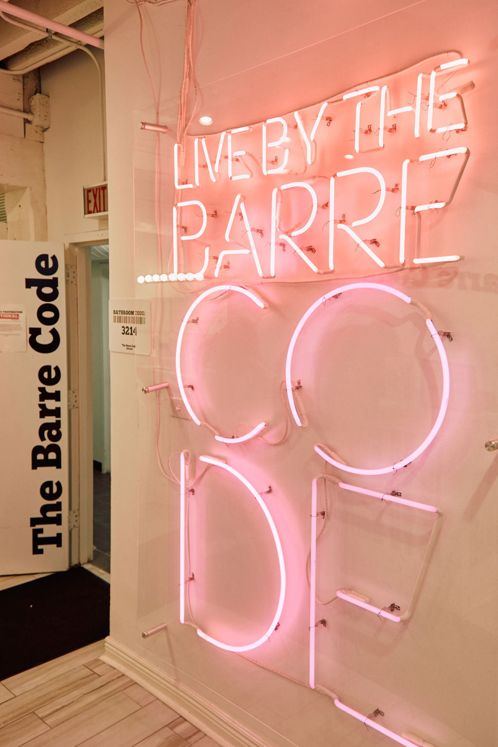 The Barre Code's famous photo opp and neon sign